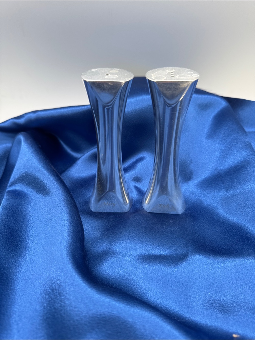 Nambé MCM Tri Corner candlestick holders in a silver metal finish. 5” tall